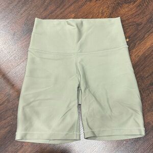 Sage green bike shorts